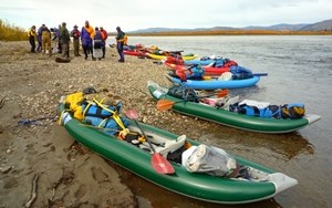 Kayaks on the shore of the Yukon River