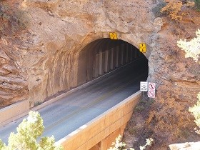 Opening of a car tunnel on a rock face.