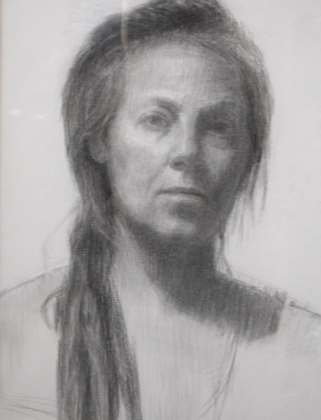 Charcoal self portrait of artist Lorraine Lans