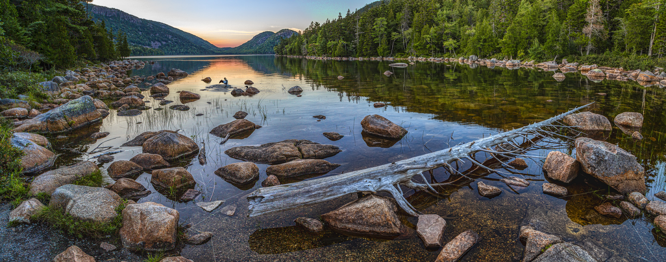 Landscape photograph of Jordan Pond with the Bubbles in the distance