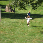 Emma Running in meadow