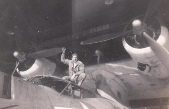 A captain crouches on his plane