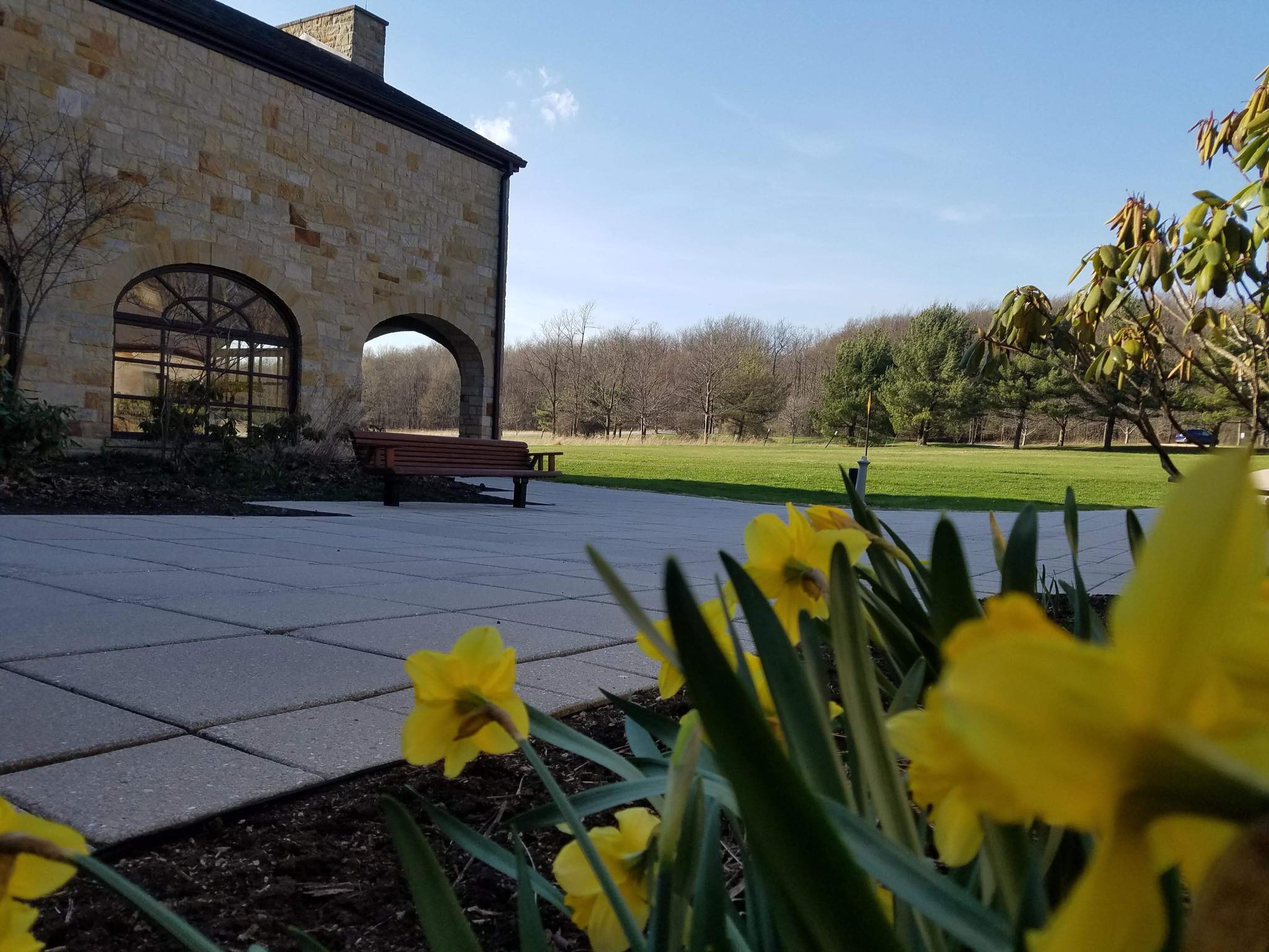 Part of the Visitor Center with spring flowers.