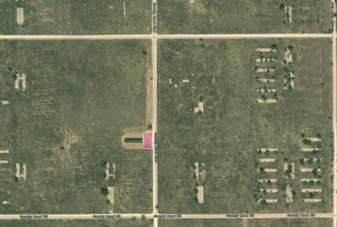 Map showing gridded dirt roads. County road 23.5 runs down the center. To the left is a small pink box.