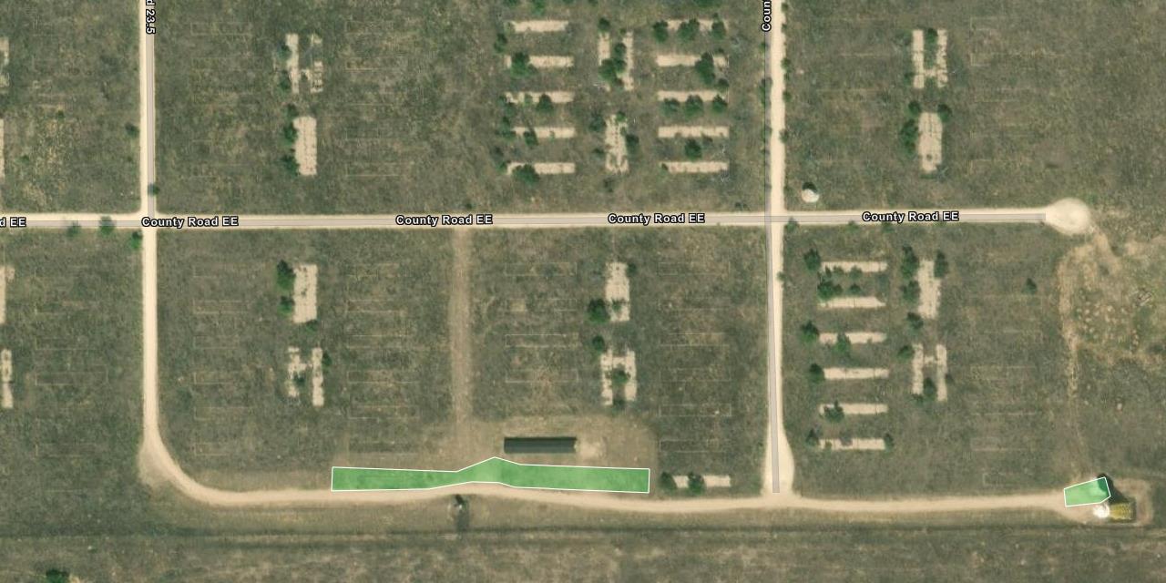 Map showing gridded dirt roads. County Road EE runs left to right through the middle of the map. Below County Road EE is another unlabeled road. Just above that road is a skinny green box. At the right-most end of the road is a small green box.