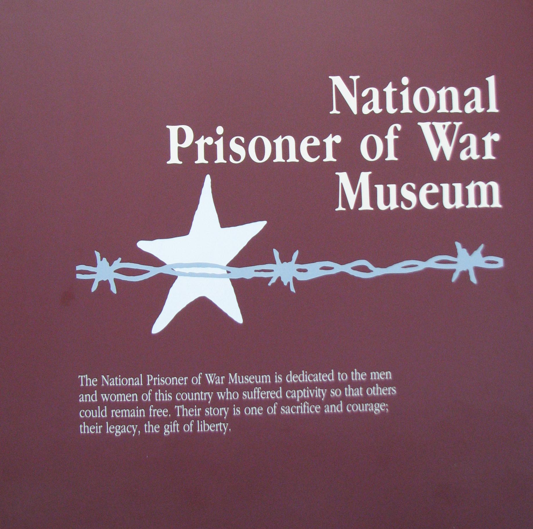 Sign marked with the National Prisoner of War Museum Logo