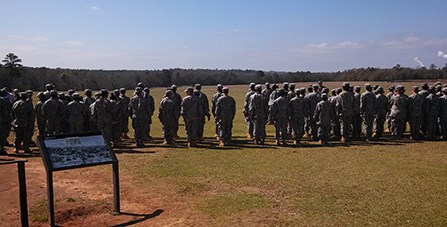 JROTC Cadets stand in uniform on the prison site