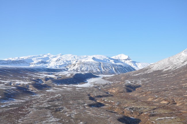 View from a bush plane of a snow-covered volcanic caldera