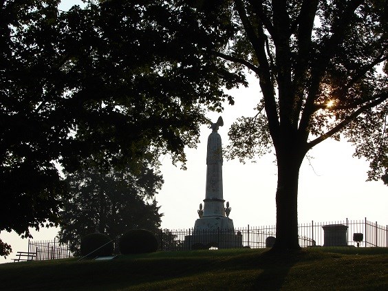 An image of the cemetery at sunrise in silhouette