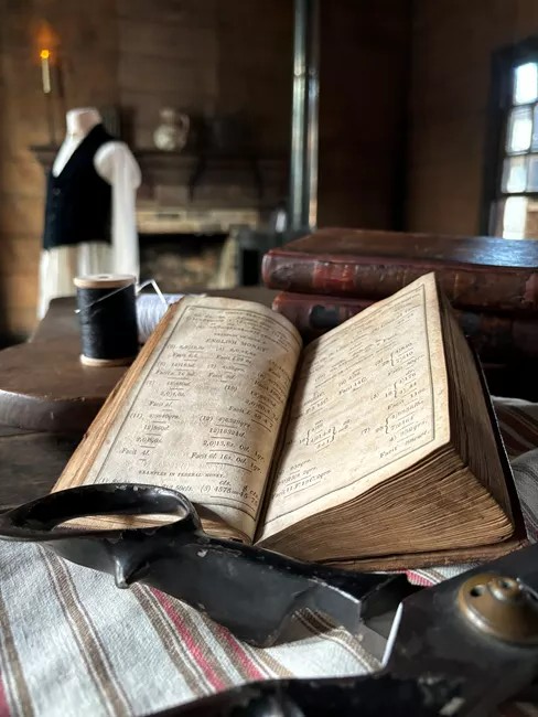 Tailor Shop interior with book