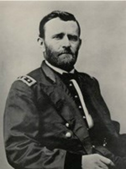 black and white photograph of a white man in a military uniform with his hair neatly combed he also has a trimmed full beard and a mustache