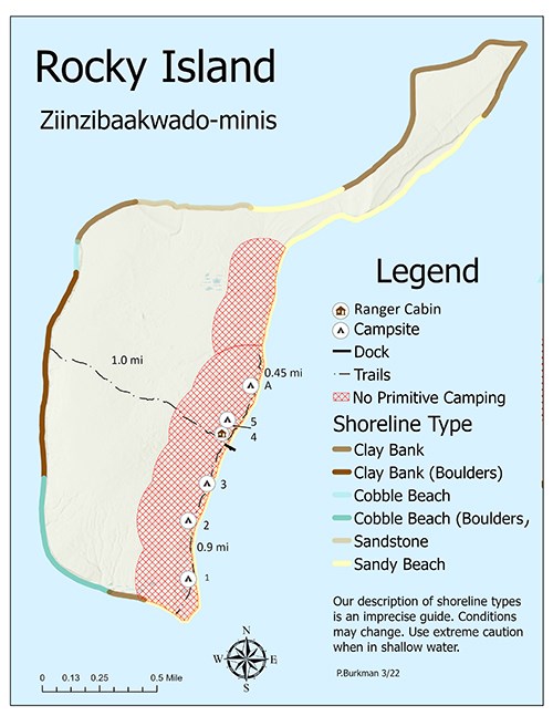 A map of Rocky Island showing trails, shoreline, topography, and primitive camping zones.