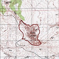 a topographic map showing a portion of Arches National Park, A red line encompasses an area labeled as Fiery Furnace.