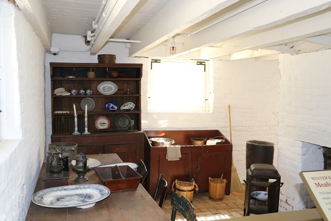A kitchen in a basement.