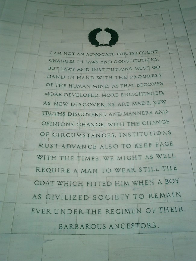 Interior wall of Jefferson Memorial with inscription in bronze block letters