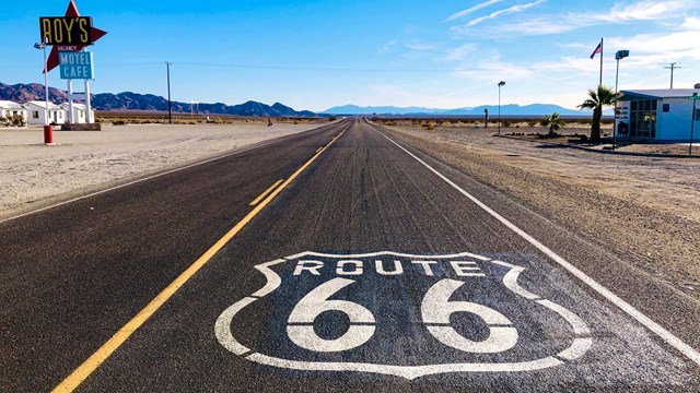A close up of a road painted with Route 66