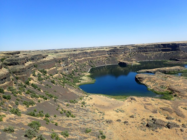 Arid landscape with small lake