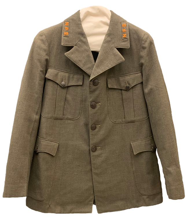 Green uniform with bronzed buttons down the front and on pockets with NPS embroidered on collars on a hanger