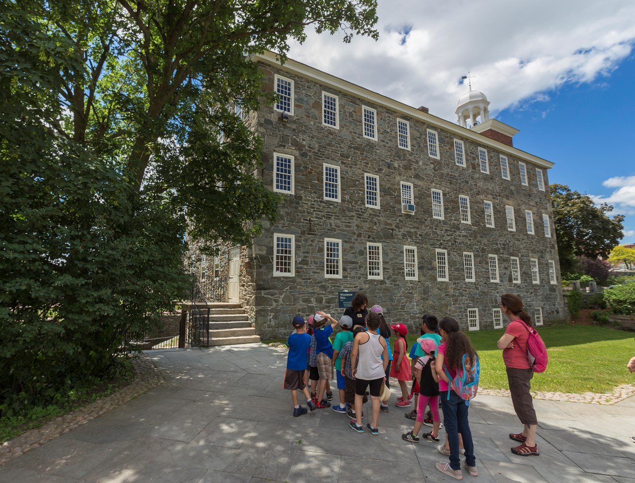 Children visiting Slater Mill on a field trip