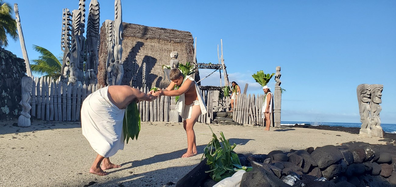 Cultural practitioners present offerings at Hale o Keawe during the annual Makahiki ceremony