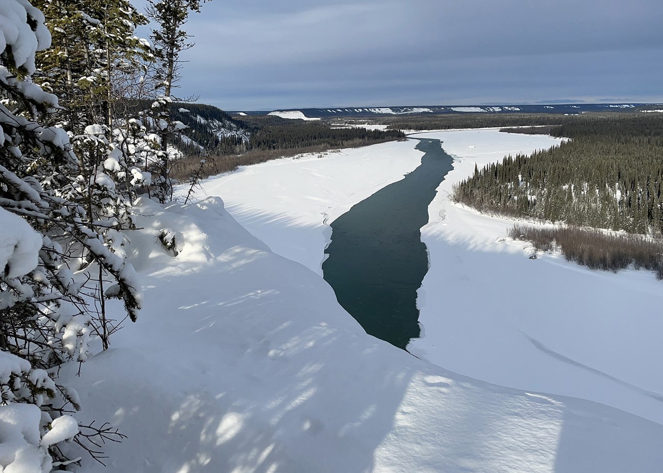 A river with open water in the winter.