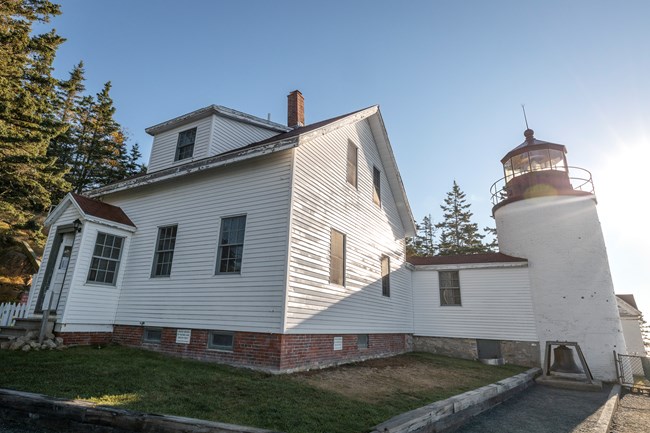 Bass Harbor Head Lighthouse and accompanying house attached to the lighthouse.