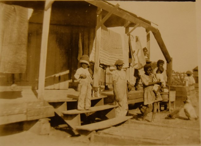Historic photo of tenant cabin along the Cane River.