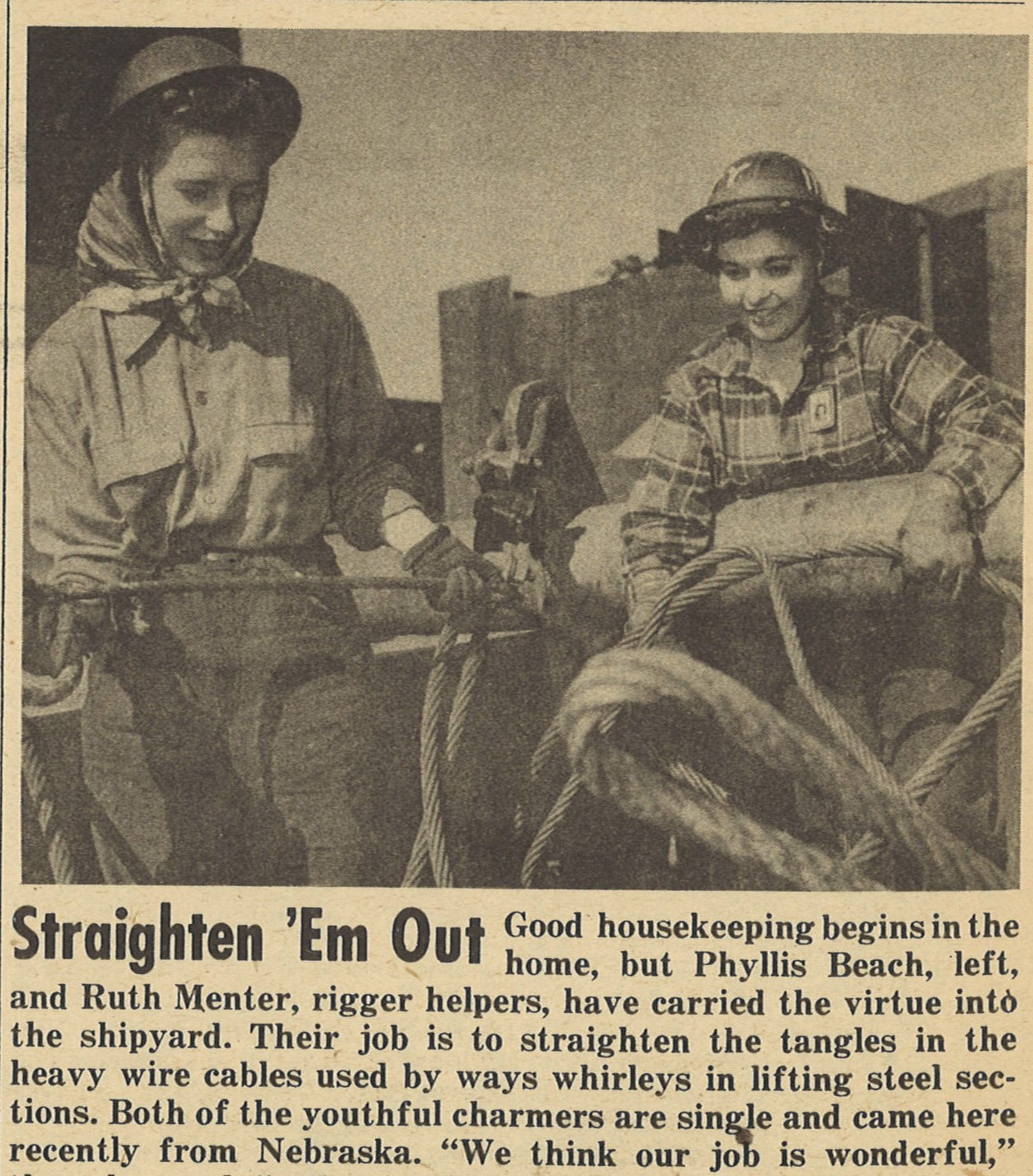 Two female rigger helpers untangle a ships’ wire cables. Text below the image reads: Straighten 'Em Out. Good housekeeping begins in the home, but Phyllis Beach, left, and Ruth Menter, rigger helpers, have carried the virtue into the shipyard.