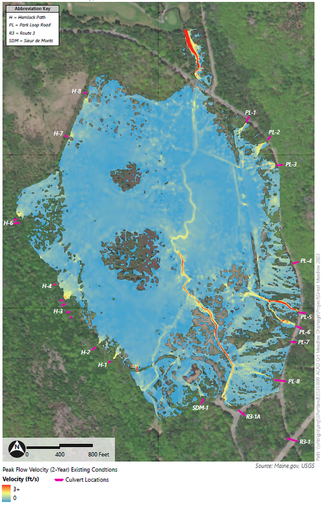 Satellite image of the oval-shaped wetland with red-to-blue overlay indicating water velocity and pink dashes around all sides indicating culvert locations. Flow is mostly slow, but there are areas leading to some of the culverts where peak flow is high.