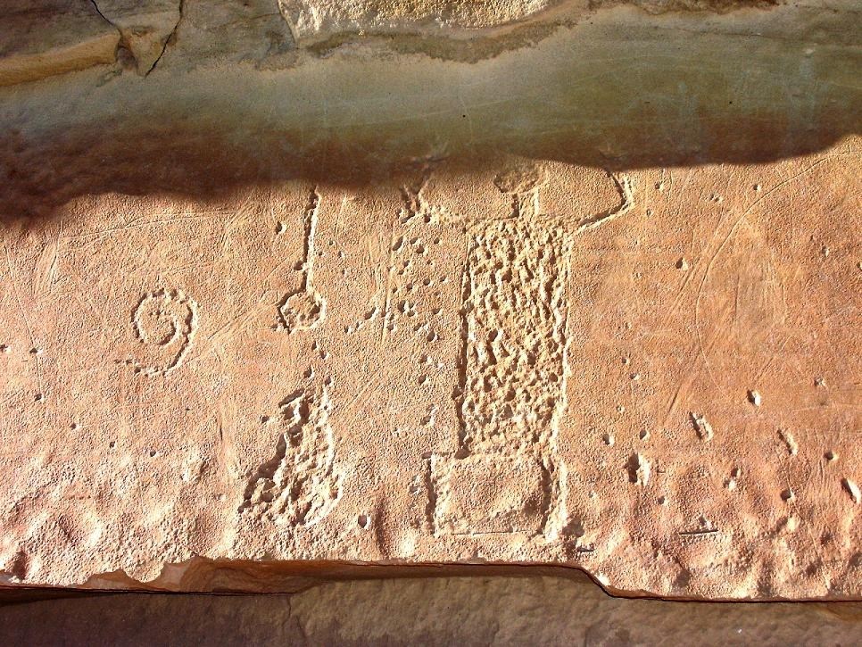 Petroglyph at Chaco Culture NHP showing abrasion, drilling, and carving.