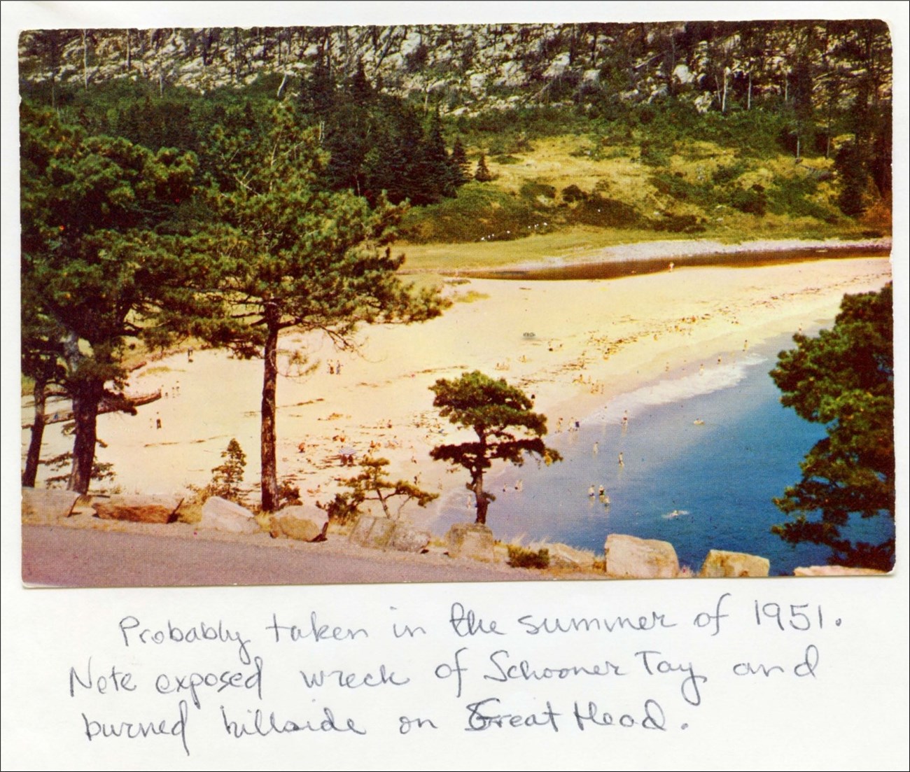 Wreckage along a sandy beach