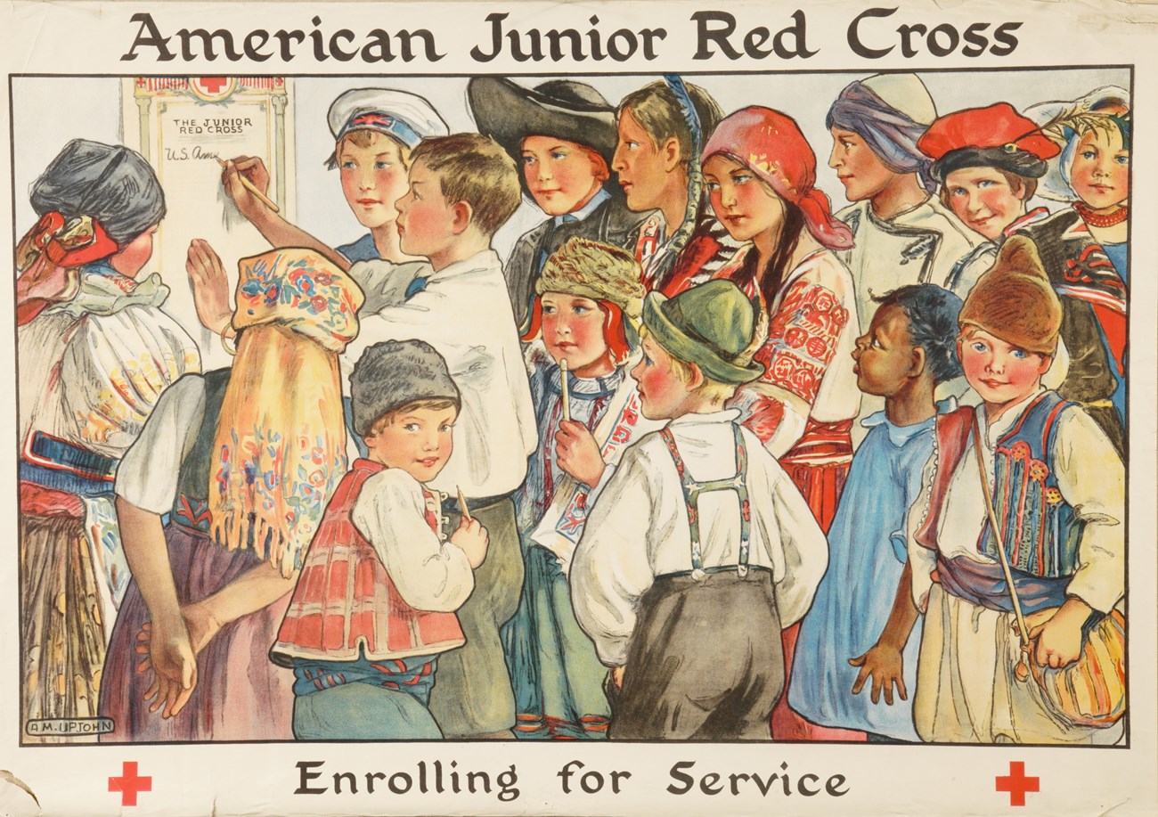Illustrated color photo of children in mnay different ethnic costumes and the phrase "American Junior Red Cross, Enrolling for Service."