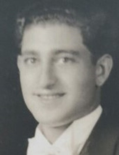 Portrait of a young man in a suit.