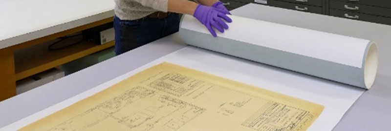 Roll “leader” end of bond paper to cover tube.