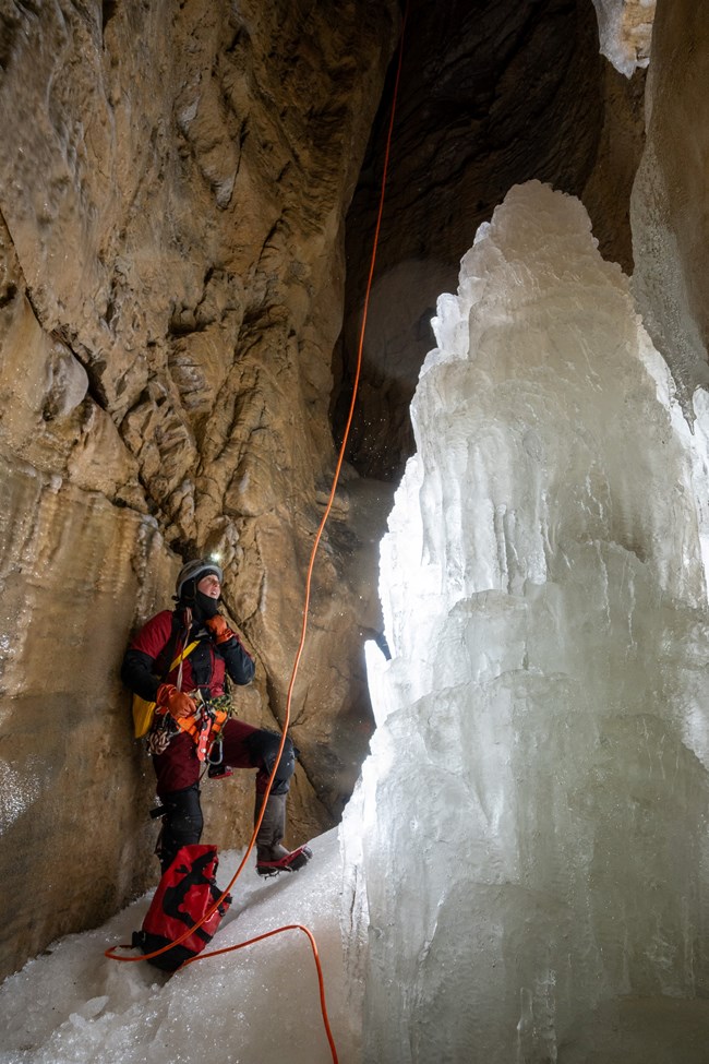Checking out ice at bottom of Deep Fall JK photo