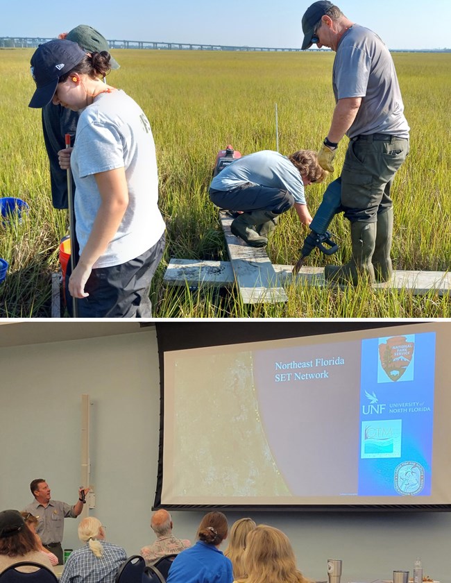 People standing in a marsh on a platform and a man talking to a group in front of a large screen