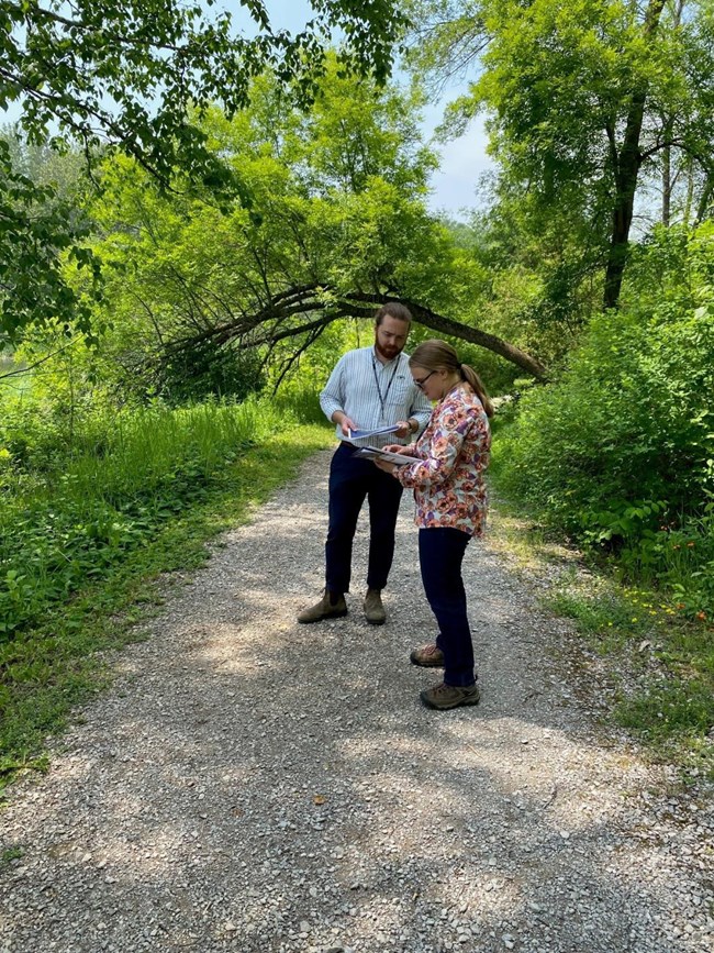 Picture: Chris Morgan, community planner with the Midwest Region of RTCA, confers with Allison Brooks, a planner with the City of Duluth (Courtesy Midwest Region of RTCA)