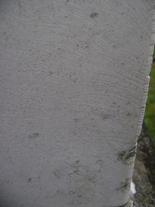 Closeup damage detail of the improperly cleaned obelisk.