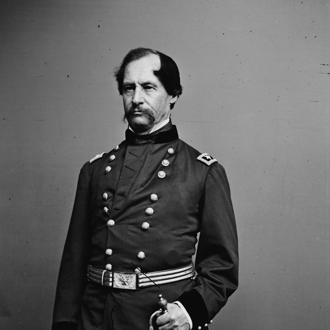 Black and white image of a man with a mustache in a Union Civil War uniform.