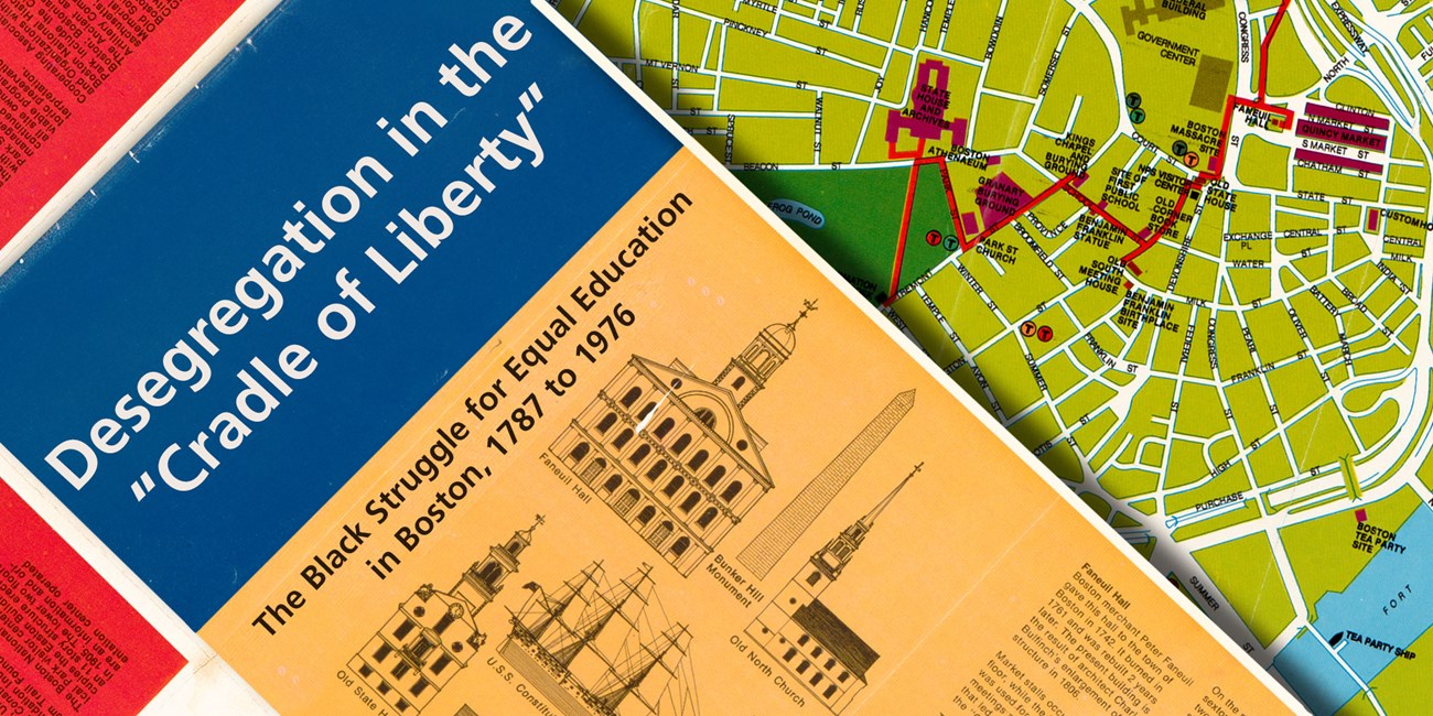 A brochure is sideways with a central blue area with black text that reads Desegregation in the Cradle of Liberty. A black subtitle over a gold background reads The struggle for Equal Education in Boston, 1798 to 1976.