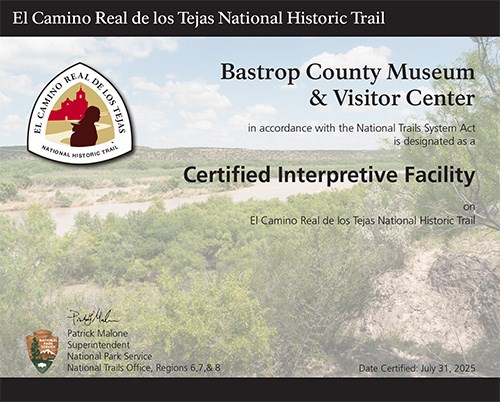 Certificate with a black band at the top, trail logo, desert brush background image, and text.