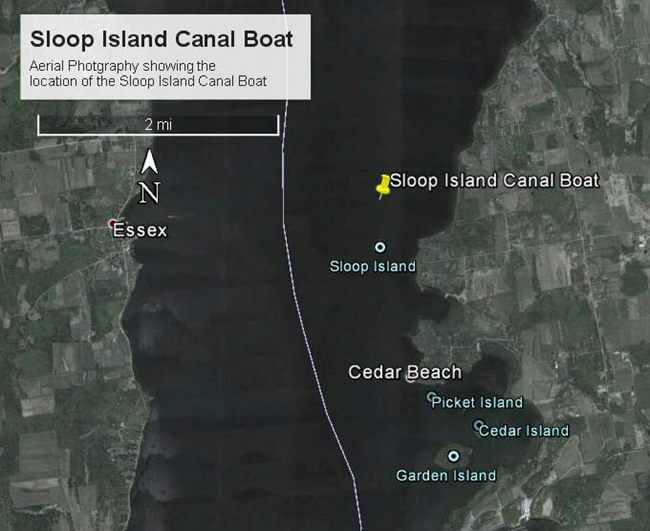 Figure 2: Aerial photography showing the project location with a yellow pin off the northwest coast of Sloop Island.