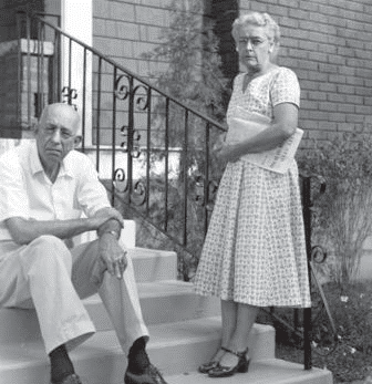 Photo of Frank and Natalie Wallace on the steps of their home