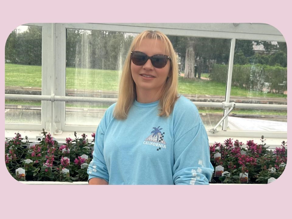 Chatham garden volunteer Carol Frye in one of the Chatham greenhouses.