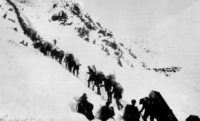 Ascending the Golden Stairs up to Chilkoot Pass on the Chilkoot Trail, 1897