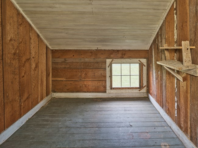 A small wood paneled room in the Ferry House