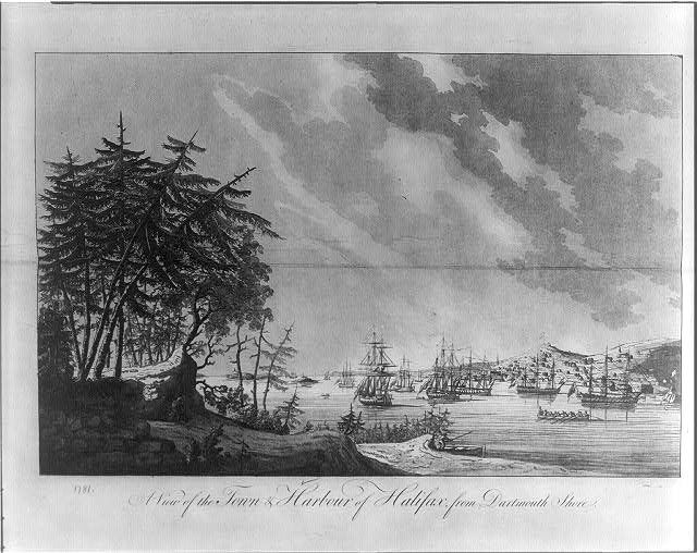 Print depicted ships in a harbor with a view of a town in the distance.