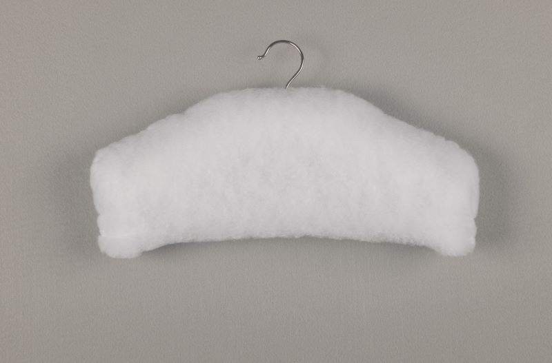 Demonstrating what the hanger should look like after batting has been fully stitched.
