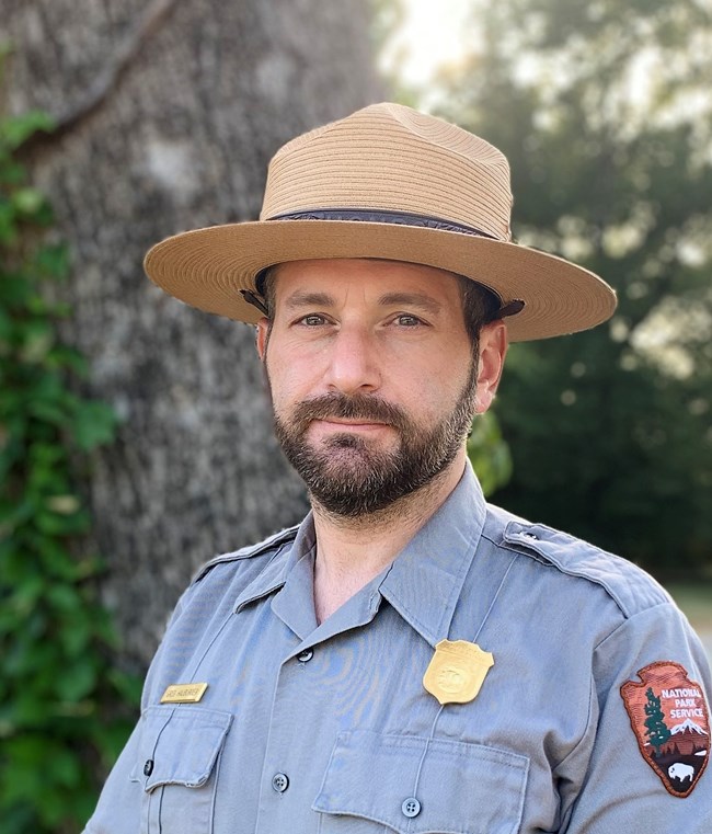 alt="Portrait photography of Gregory Hauburger in NPS uniform"