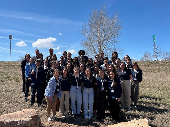 Community Volunteer Ambassadors smile for a group photo
